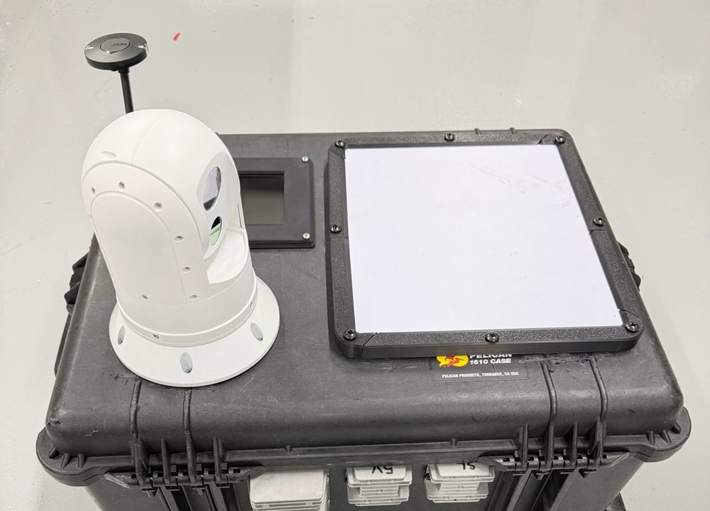 Drone-in-a-Box field kit: camera turret, GPS puck and display panel on a rugged case